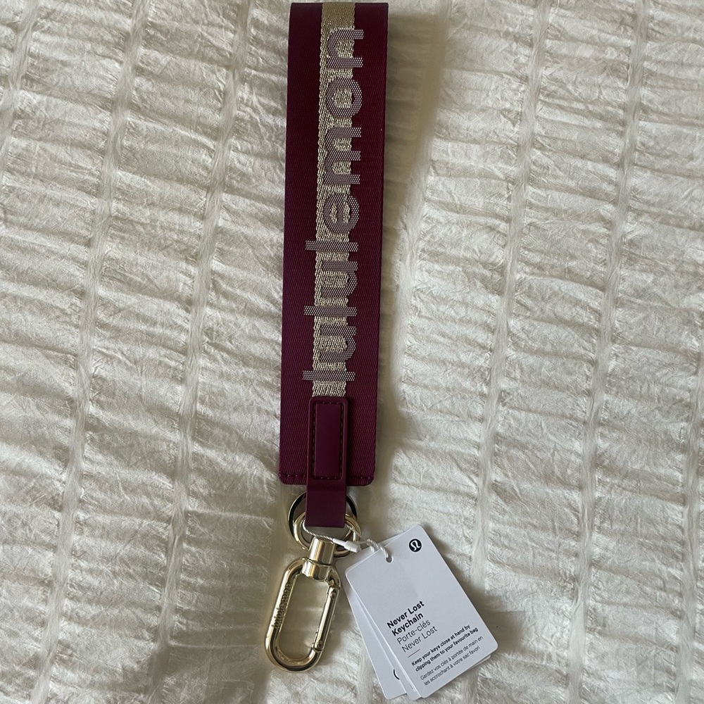 Lululemon Athletica Neverlost Keychain Deep Luxe/ gold/ bone